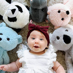 Baby with heartbeat stuffed animals